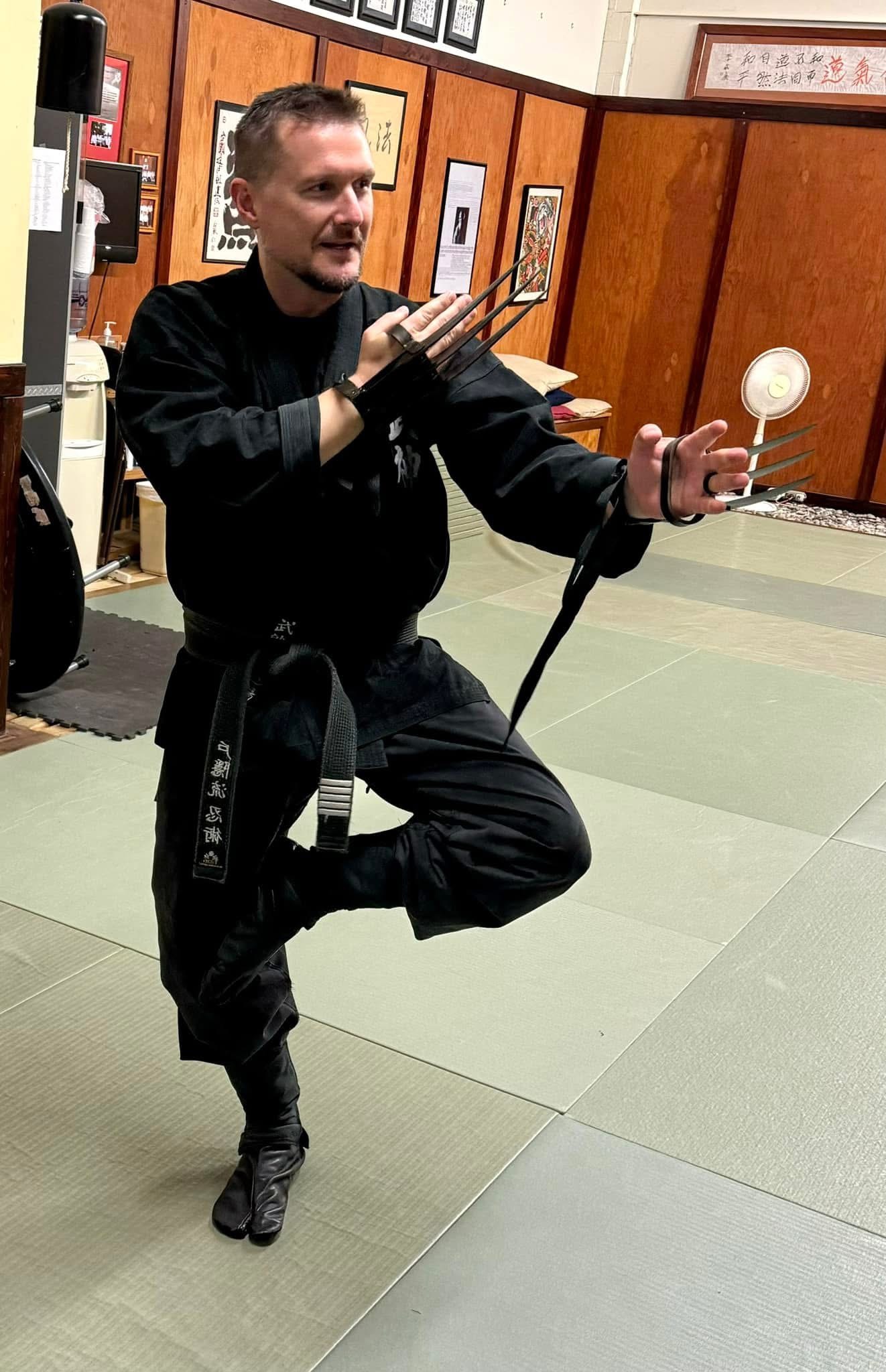 Shidoshi Bryan Garner demonstrating sai weapons technique at Kashiwa Bujinkan Ninjutsu dojo